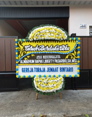 Papan Bunga Duka di Daon